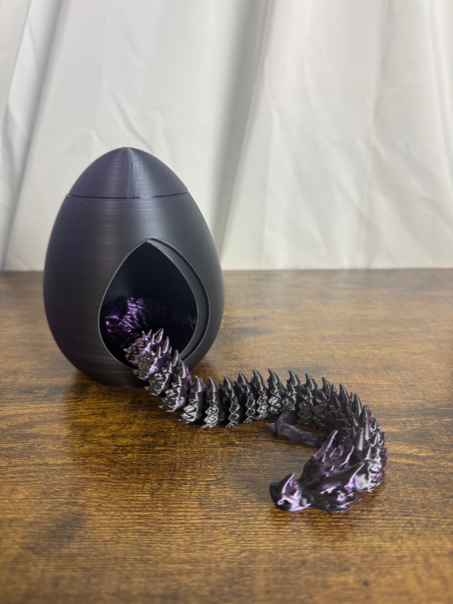 3D Printed articulated Dragon with Revolving Egg