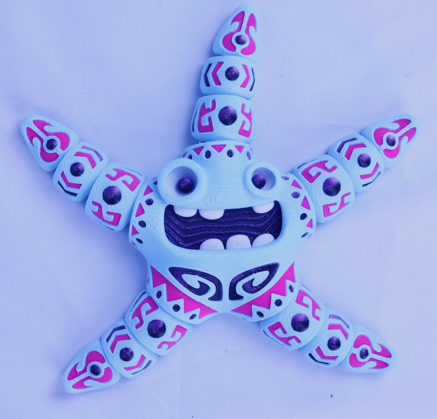 3D Printed articulated Psychedelic Starfish Toy